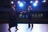 Graduate receiving diploma on stage