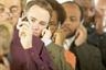 Men standing in line to collect unemployment insurance