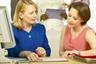 Job sharing women at work station