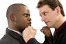 Black and white workers in battle