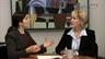 Two women at unpleasant meeting